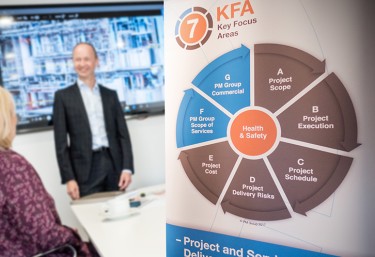 7KFA banner during a meeting