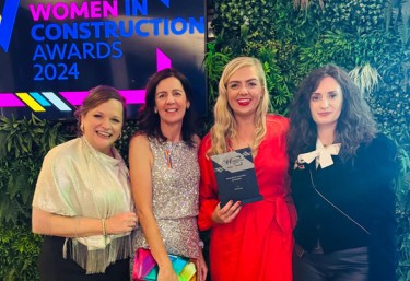 PM Group collecting the Diversity and Inclusion Champion Award from the Women in Construction Awards